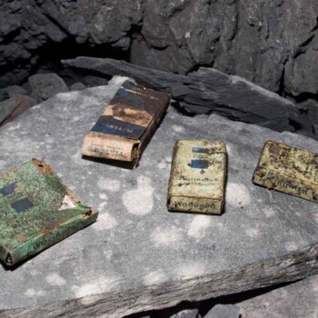 Discover items left behind by the miners when they left in 1970, lots of items to discover on a Corris Mine Explorers trip in Mid Wales. Real authentic history. Discarded cigarette packs in Corris Mine Explorers, Wales